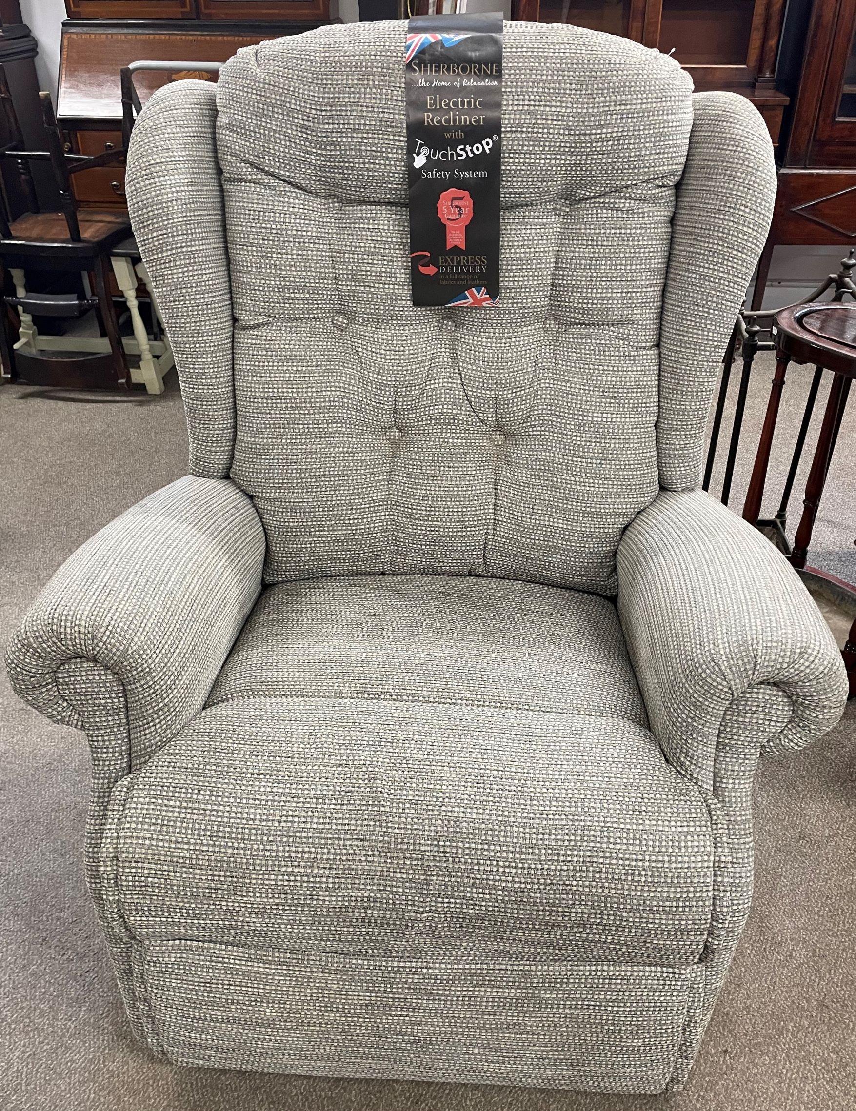 Modern electric recliner chair by Sherborne