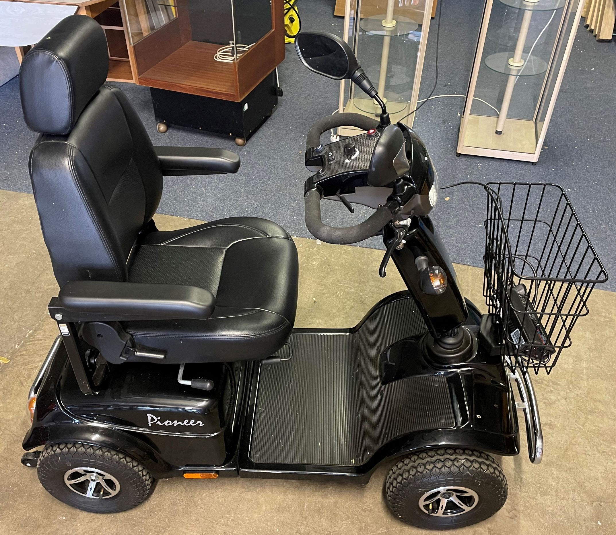 Pioneer Rascal mobility scooter in extremely good condition with charger pack & instruction manual