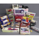 Collection of boxed cars includes Corgi, bus, vans, classics, Morris Minor, Thronycroft van, Ford