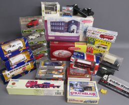 Collection of boxed cars includes Corgi, bus, vans, classics, Morris Minor, Thronycroft van, Ford