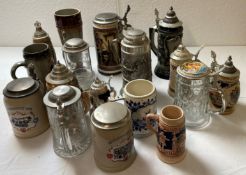 Collection of steins and tankards including one musical stein