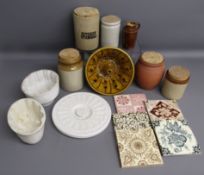 Collection of stoneware includes utensils pot, cork lidded pots, terracotta storage jar, lid from