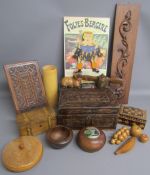 Collection of treen and other wooden items includes carved fruit, Philip Greenwood with iris