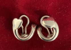 Pair of Georg Jensen clip on silver earrings with heart shape motifs. Please note the hinge pin on