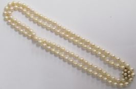 Knotted pearl necklace with 9ct gold clasp in G. Hewitt Grimsby case - approx. 90cm long