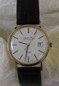9ct gold Smith Bros of Rotherham wristwatch with date aperture on leather strap