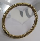 9ct gold hollow twist bangle - total weight 8.7g