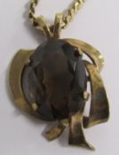 9ct gold fancy link necklace (5.3g) with 9ct gold mounted smokey quartz pendant - total weight 8.5g