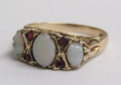 9ct gold opal and ruby ring - ring size O/P - total weight 3.3g (slight damage to 2 opals)