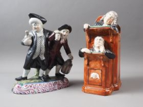 A Ralph Wood Staffordshire figure group, "The Vicar and Moses", 6 1/2" high, and a 19th century