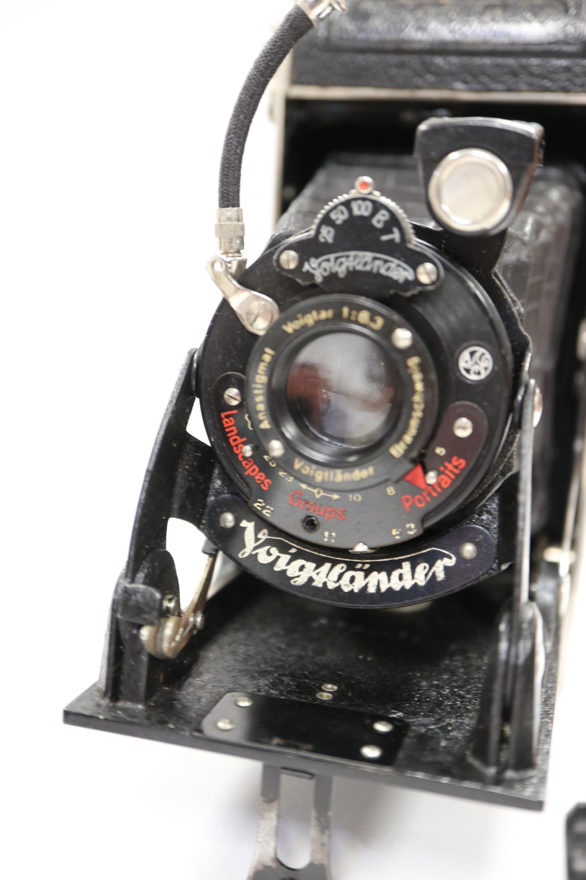 A Voigtlander vest pocket camera and a Kodak camera - Image 2 of 4