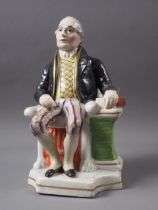 A 19th century Staffordshire figure of James Sadler, balloonist, 9 1/2" high, (small chips to base