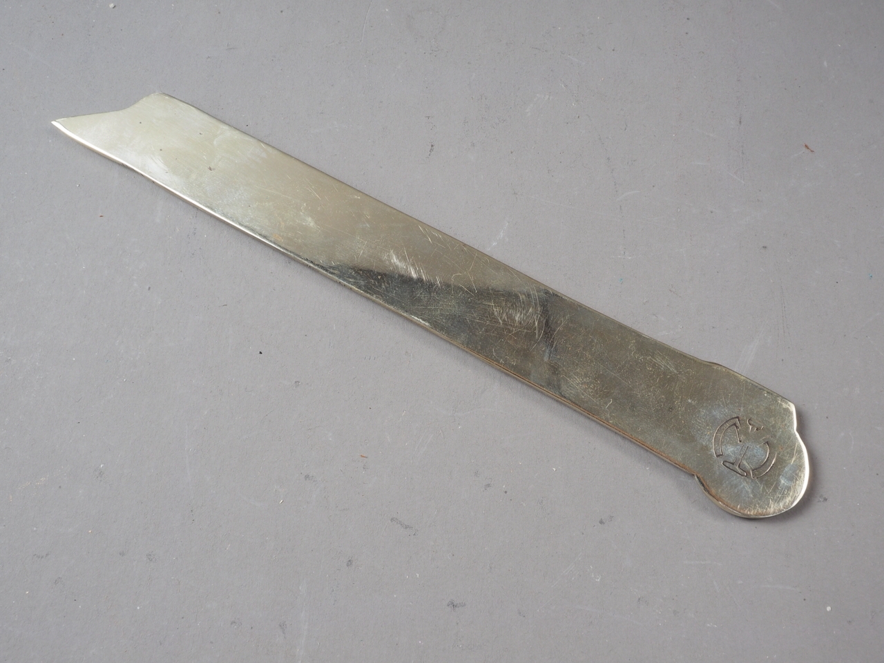 An Oriental letter opener, formed as a speed train, 7 1/4" long - Image 2 of 2