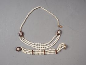 A 9ct gold, garnet and seed pearl choker, and a matching three-strand bracelet