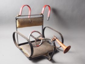 A child's vintage driving seat
