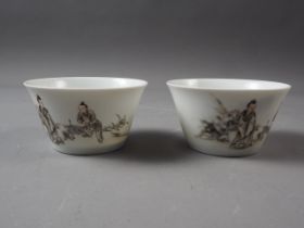 A pair of Chinese porcelain bowls with figure and seal decoration, 3 3/8" dia