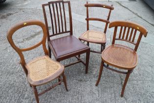 A chapel chair, two cane seat bedroom chairs and a 1930s bentwood chair