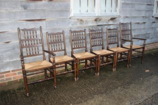 A set of Titchmarsh & Goodwin oak and ash spindle back rush seat dining chairs (4 + 2)