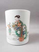 A Chinese porcelain brush wash with figure and landscape decoration, 5 1/2" high