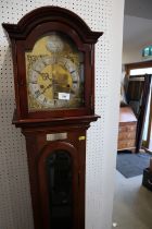 A mahogany long case clock with brass dial and silvered chapter ring, dial 8" wide, with striking