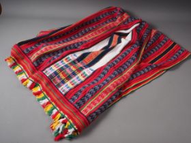 A North African style blanket with zig-zag and striped design, embroidered " Mrs V Derham, Merry X-