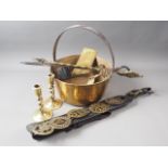 A brass preserve pan, a leather chest strap with five horse brasses and other brassware