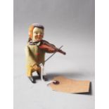 An early 20th century Schuco Clown violinist, 4 1/2" high, (no key)