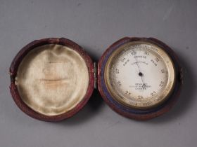 A Stanley brass cased pocket barometer, in Morocco leather case