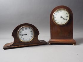 An Edwardian mahogany and brass inlaid mantel clock with white enamel dial, 9 1/2" high, and an