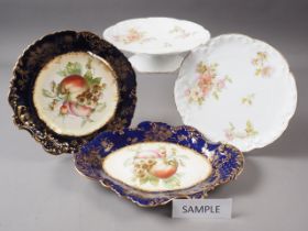 An Edwardian fruit decorated part dessert service and a Limoges dessert service