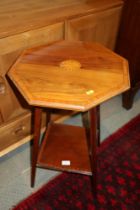 An Edwardian walnut, kingwood banded and inlaid octagonal top two-tier occasional table, on square