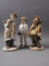 Norman Underhill: two ceramic figures old men in cloth caps, 7" high, and Laura Done: a ceramic