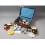 A number of lady's powder compacts, a doll's teaset, a group of figure decorated pill boxes and a