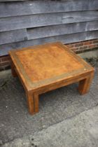 An Art Deco style burr walnut quarter veneered and brass inlaid square top coffee table, 32" wide