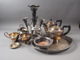A silver plated gallery tray, a plated three-piece part tea service and other plate