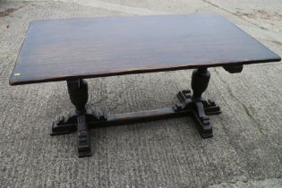 An oak refectory style table, on bulbous turned supports, 60" wide x 33" deep x 29" high