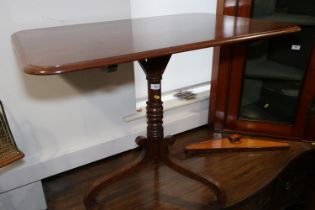 A 19th century mahogany rectangular top occasional table, on turned column and tripod scroll