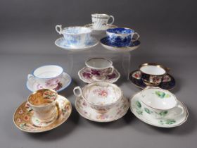 A Davenport floral panel and gilt decorated cabinet cup and saucer and nine other 19th century