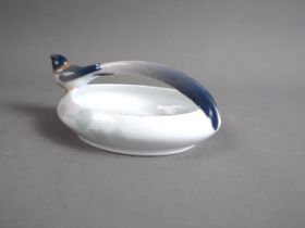 A Royal Copenhagen porcelain Art Nouveau bird dish, 753/376, 6" wide (very small chip to beak)