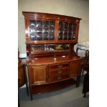 An Edwardian Maple & Co Paris, mahogany and satinwood banded bowfront sideboard with glazed cupboard