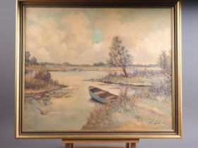 An oil on canvas, lake scene with rowing boat, indistinctly signed, 19 1/2" x 23 1/2", in gilt and