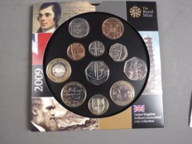 A Royal Mint 2009 United Kingdom brilliant uncirculated coin collection, including the Kew Gardens