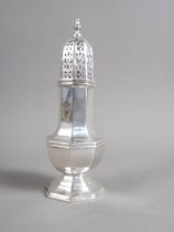 A silver sugar caster, a silver cream jug and a silver mounted pepper grinder, 8.6oz troy approx