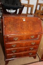 A burr walnut fall front bureau, fitted four drawers, on bracket feet, 30" wide x 16 1/2" deep x 42"