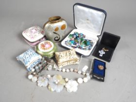 Two Capodimonte trinket boxes, two other Continental trinket boxes, a jade floral necklace and two