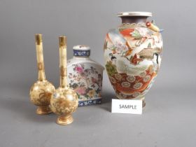 A selection of Chinese and Japanese ceramics, including a pair of Japanese Satsuma sprinkler vases