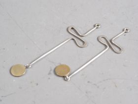 Wendy Ramshaw: a pair of silver and yellow metal drop earrings, 2 3/4" long (lacking pillars)