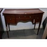 An Edwardian mahogany and ebony strung bowfront sideboard, fitted central drawer flanked