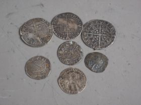 An Elizabeth I silver sixpence, dated 1561, another similar, date obscured, and Edward III silver