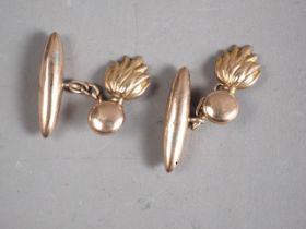 A pair of 9ct gold Grenadier guards cufflinks, 3.4g